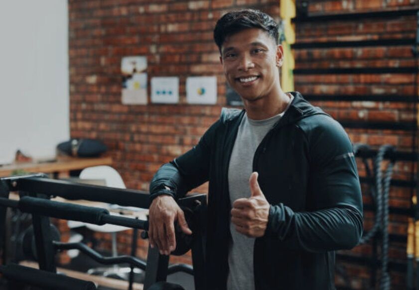 A satisfied owner of a well planned gym.