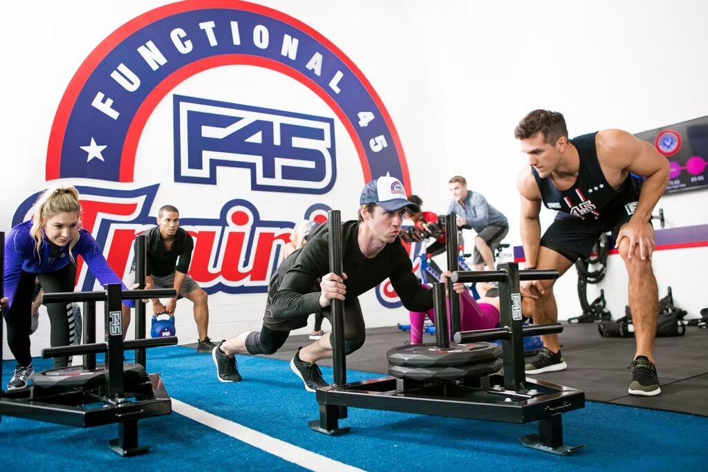 F45 Training - functional training gym and one of boutique fitness studio franchises. Source: wellhub.com