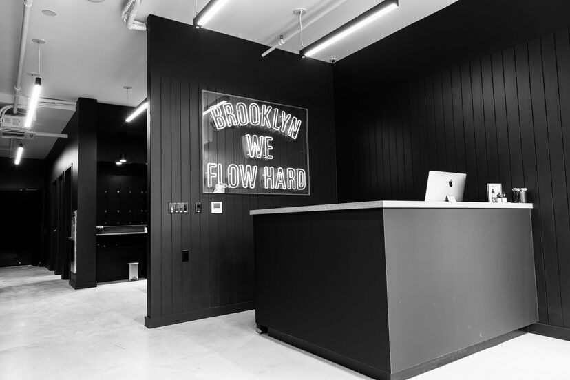 Y7 Studio - a boutique fitness concept putting together hip hop and yoga, traditionally in black and white. Source: mindbodyonline.com