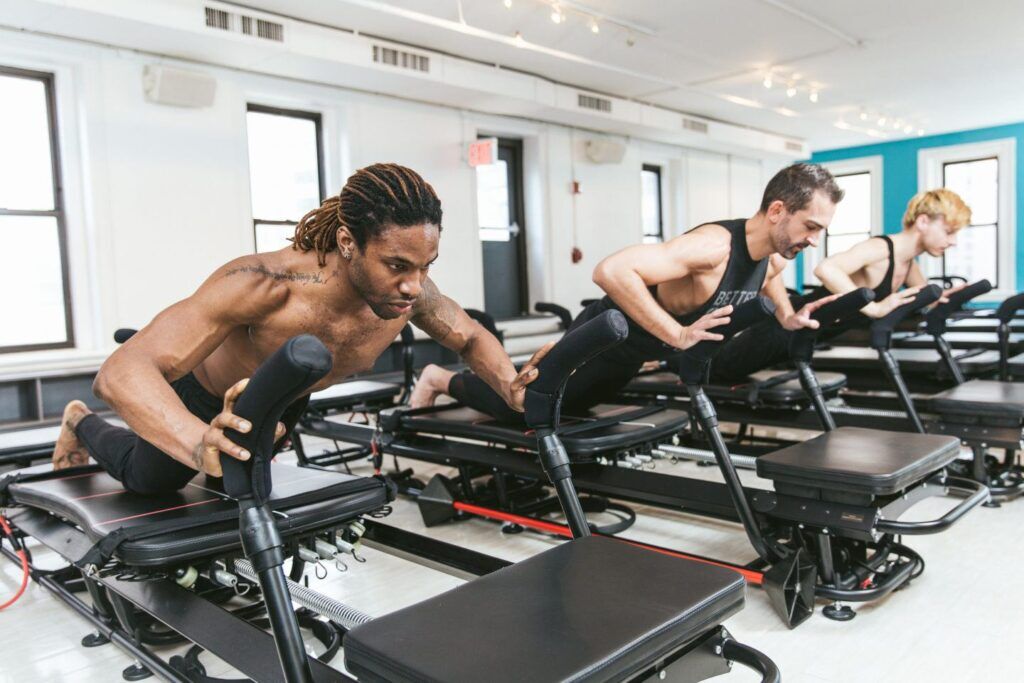 SLT boutique fitness specializes in pilates, but not only for women! Source: sltnyc.com